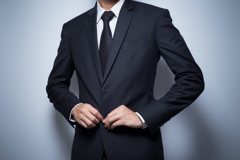 businessman dressing up black suit